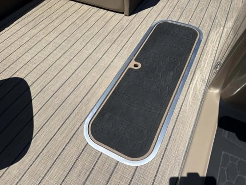 Slide: The Image of Sylvan L-3 DLZ Platnium 2026 boat deck with black cover. - 19