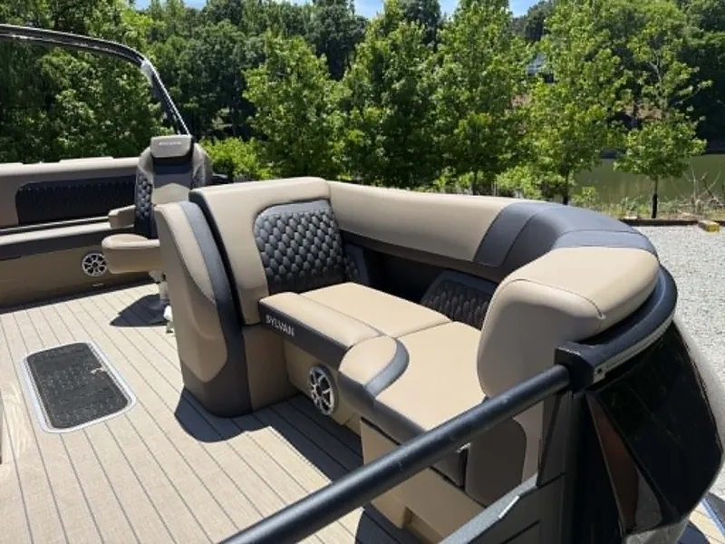Slide: The Image of Interior of 2026 Sylvan L-3 DLZ Platinum with luxurious seating. - 25