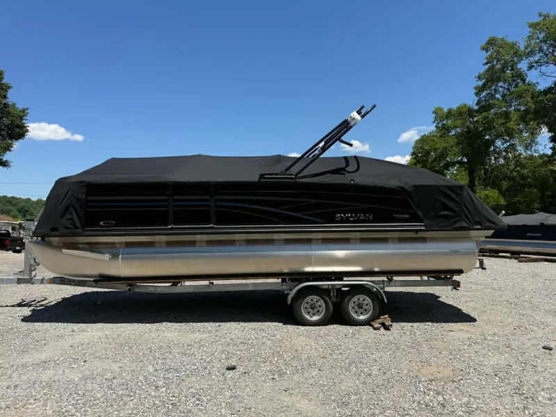 Slide: The Image of 2026 Sylvan L-3 DLZ Platnium pontoon boat with cover on trailer. - 46