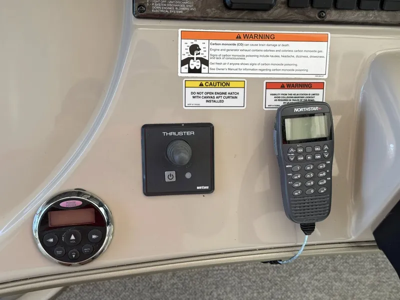 Slide: The Image of Control panel of 2008 Sea Ray 44 Sundancer with controls. - 13