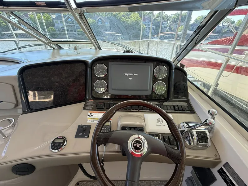 Slide: The Image of 2008 Sea Ray 44 Sundancer helm with Raymarine system. - 16