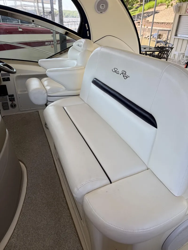 Slide: The Image of Interior of a 2008 Sea Ray 44 Sundancer with white leather seating. - 31