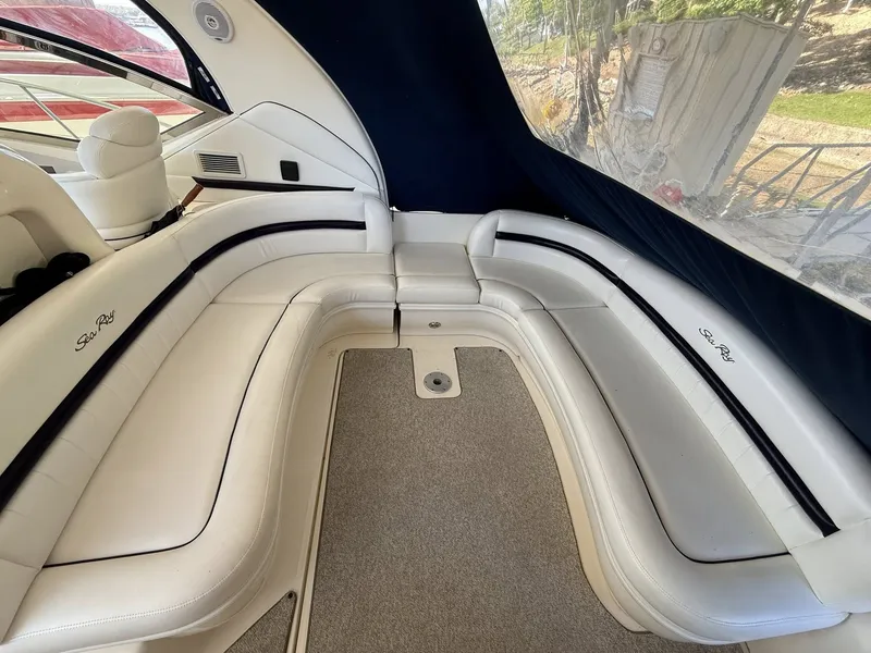 Slide: The Image of Interior of 2008 Sea Ray 44 Sundancer with white leather seating. - 5