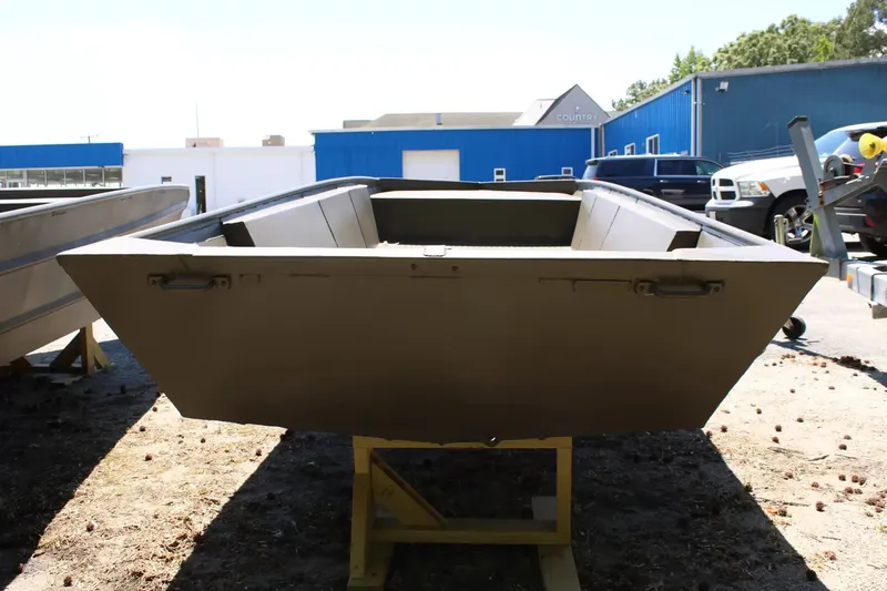 Slide: The Image of 2026 WeldBilt 1652V aluminum boat on a stand outdoors. - 4