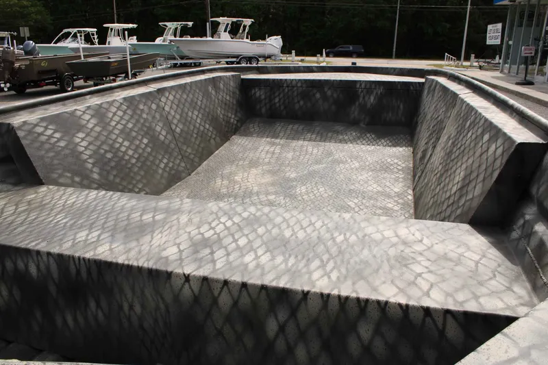 Slide: The Image of Empty WeldBilt 1660V boat hull, year 2026, on a parking lot. - 6