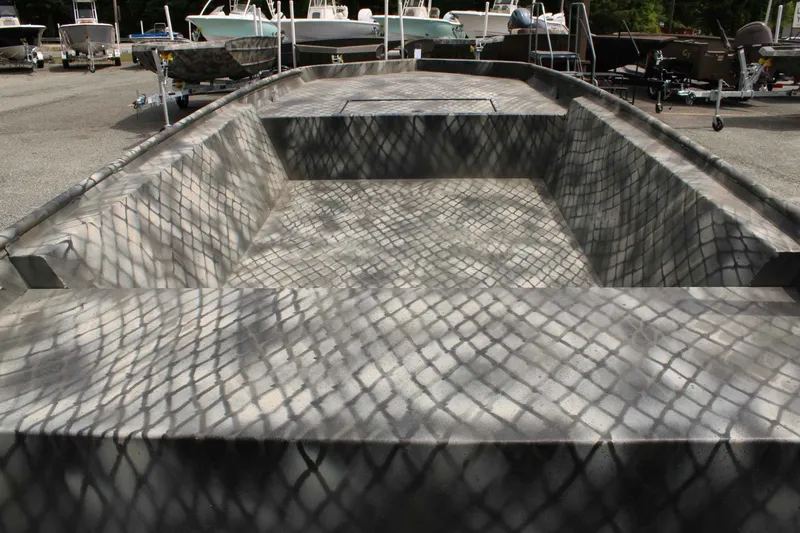 Slide: The Image of WeldBilt 1552V boat 2026 with camouflage pattern outdoors. - 10