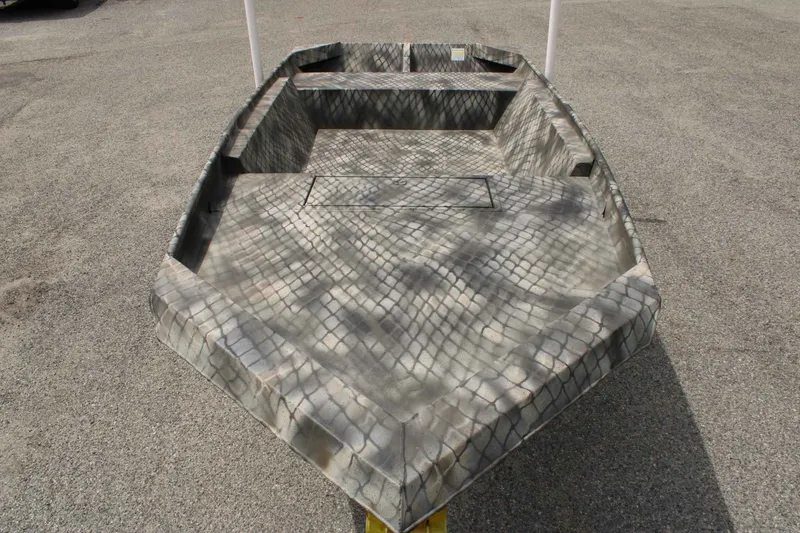Slide: The Image of 2026 WeldBilt 1552V boat with camouflage pattern on asphalt. - 13