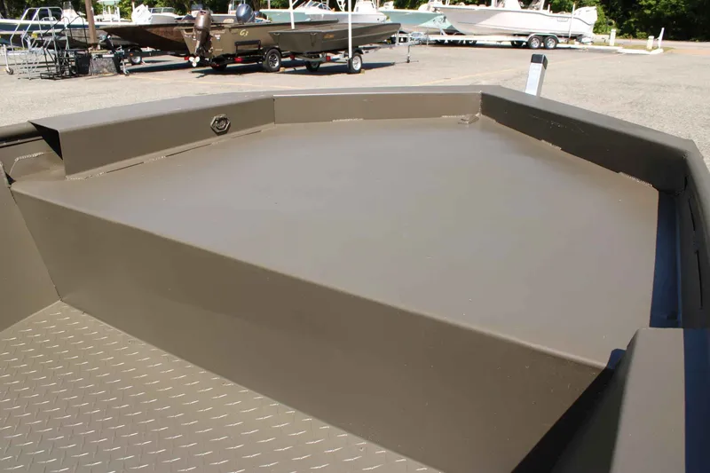 Slide: The Image of WeldBilt 1448V 2026 boat deck in a marina. - 10