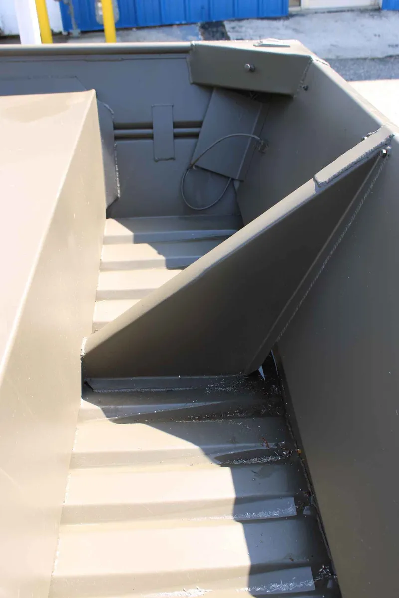 Slide: The Image of Interior view of a 2026 WeldBilt 1448V boat. - 13