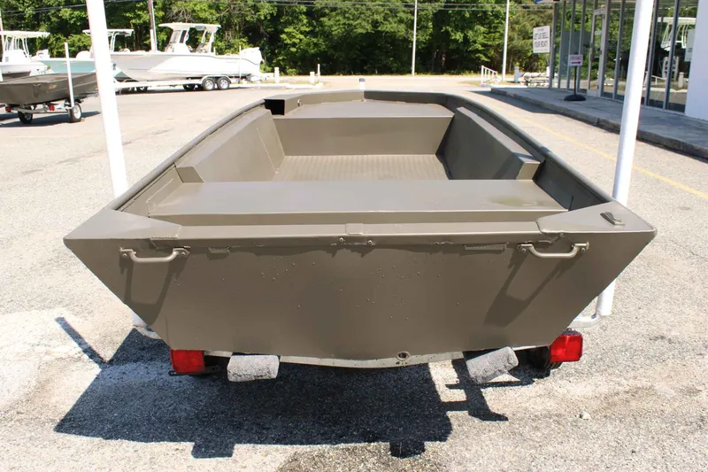 Slide: The Image of 2026 WeldBilt 1448V aluminum boat parked outdoors. - 4