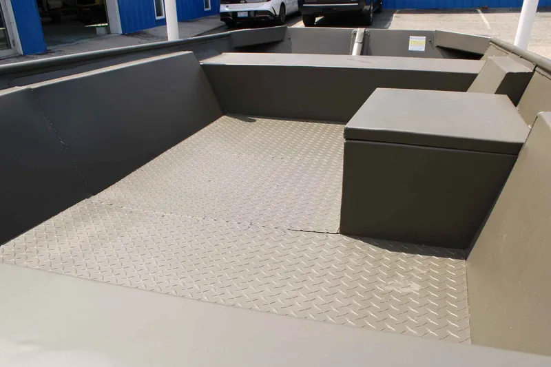 Slide: The Image of Interior of a 2026 WeldBilt 1448V boat with non-slip flooring. - 14