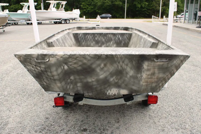 Slide: The Image of 2026 WeldBilt 1448V boat on trailer, gray camouflage pattern. - 5