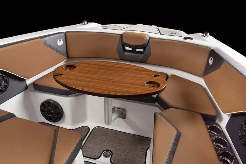 Slide: The Image of Interior of 2021 Scarab 285 ID with brown seating and wooden table. - 15