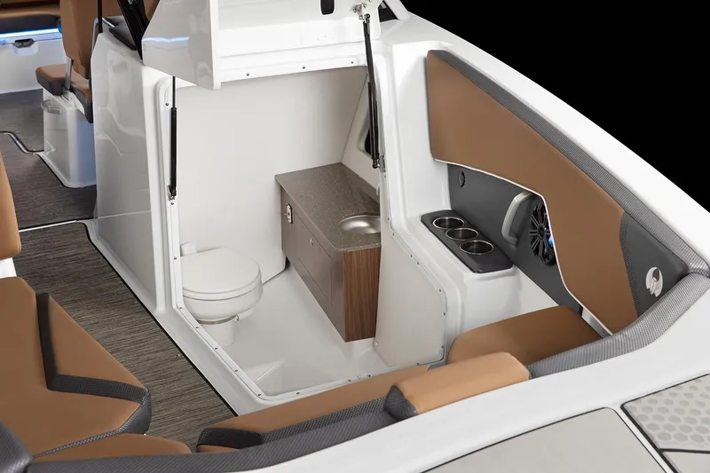 Slide: The Image of Interior of 2021 Scarab 285 ID with toilet and seating area. - 31