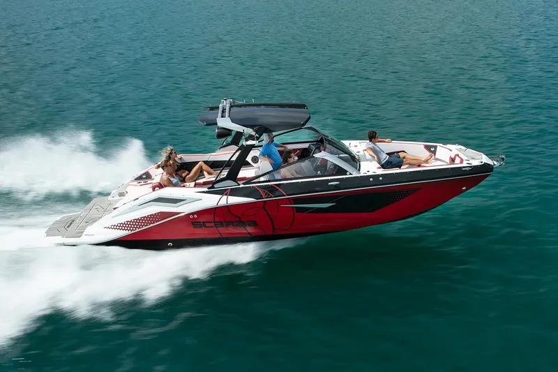 Slide: The Image of 2021 Scarab 285 ID boat cruising on water at high speed. - 4