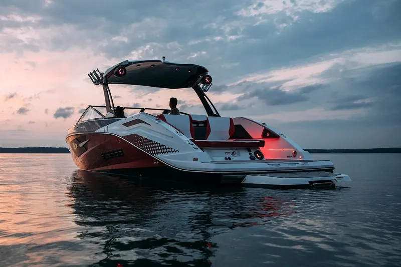 Slide: The Image of Scarab 285 ID 2021 boat at sunset on calm water. - 9