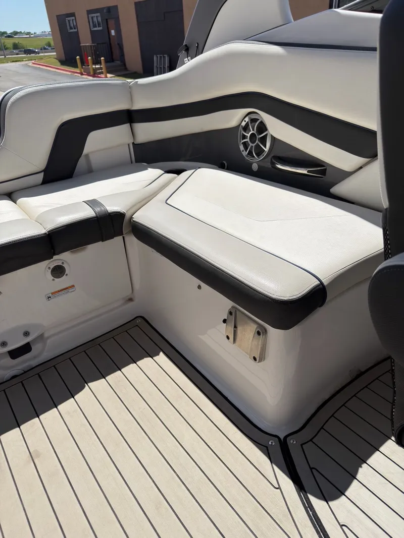 Slide: The Image of Interior of a 2020 Yamaha Boats 242S with sleek seating. - 19