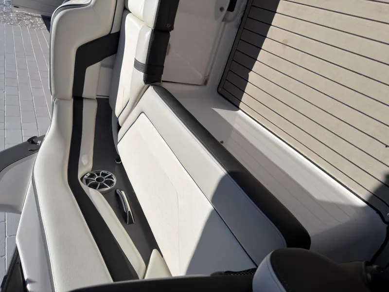 Slide: The Image of Interior of a 2020 Yamaha Boats 242S with sleek seating. - 27