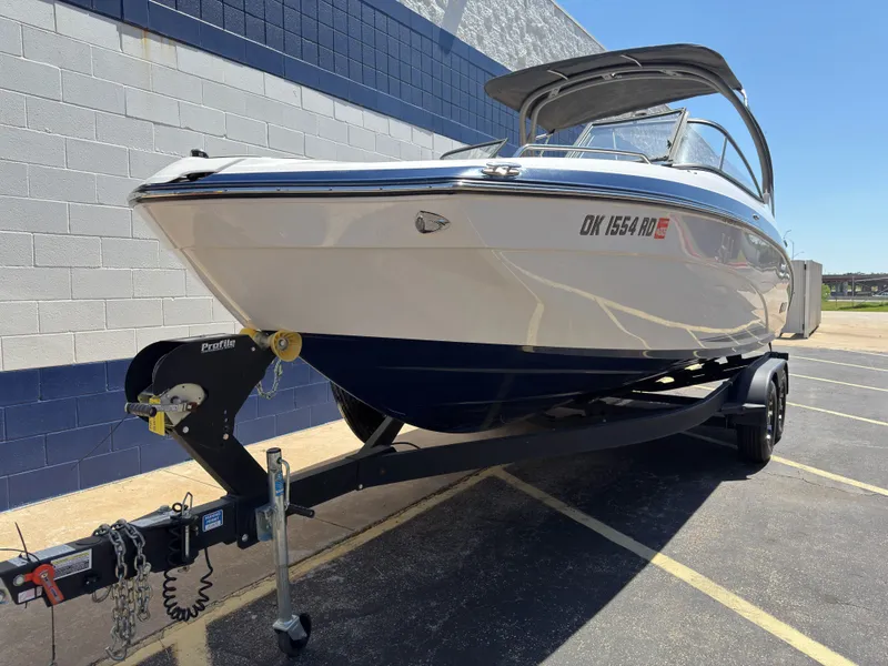 Slide: The Image of 2020 Yamaha Boats 242S on trailer, side view. - 30