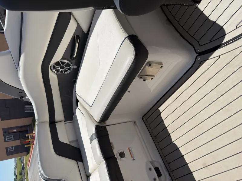 Slide: The Image of Interior of a 2020 Yamaha Boats 242S with white seating. - 35