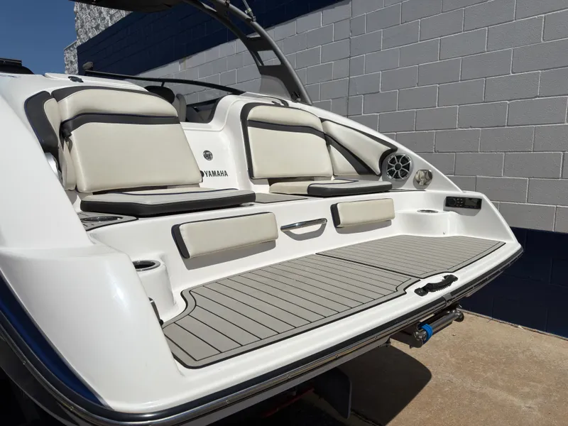 Slide: The Image of 2020 Yamaha Boats 242S with luxurious rear seating area. - 5