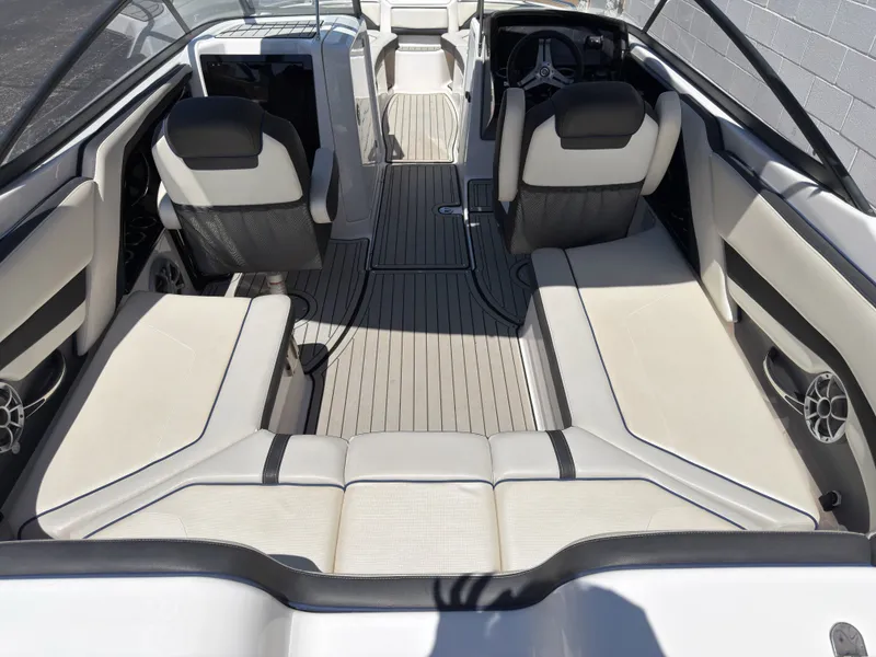 Slide: The Image of Interior of a 2020 Yamaha Boats 242S with sleek seating. - 8