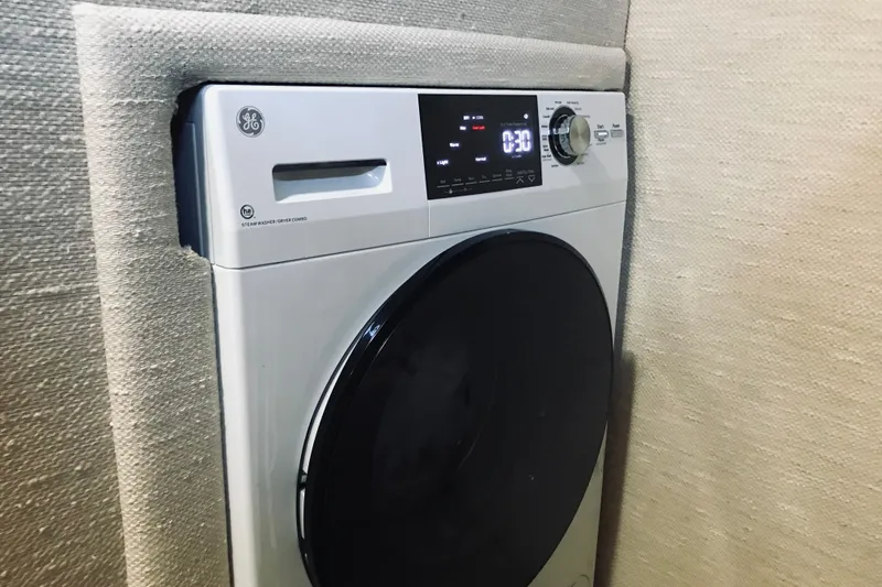 Slide: The Image of GE washer-dryer combo in a 1995 Sea Ray 550 Sedan Bridge yacht. - 26