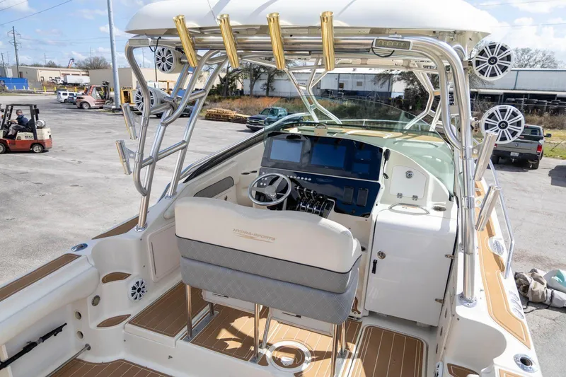 Slide: The Image of 2006 Hydra-Sports Vector 3300 VX boat interior with helm, seating, and electronics. - 14