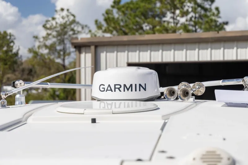 Slide: The Image of Garmin radar on 2006 Hydra-Sports Vector 3300 VX boat, outdoor setting. - 15