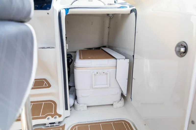 Slide: The Image of 2006 Hydra-Sports Vector 3300 VX interior storage with cooler and seating area. - 20