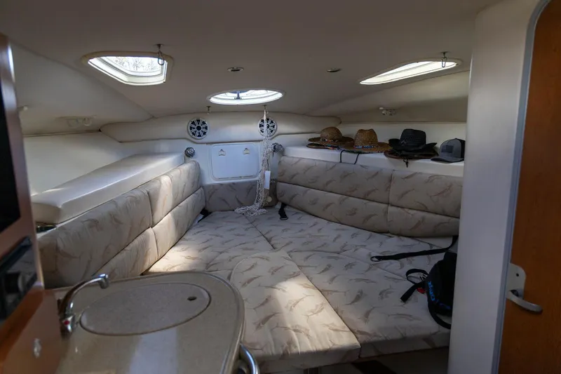 Slide: The Image of Interior cabin of 2006 Hydra-Sports Vector 3300 VX with cushioned seating and skylights. - 34