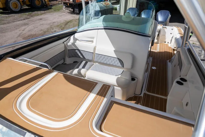 Slide: The Image of 2006 Hydra-Sports Vector 3300 VX boat interior with seating and wood accents. - 5