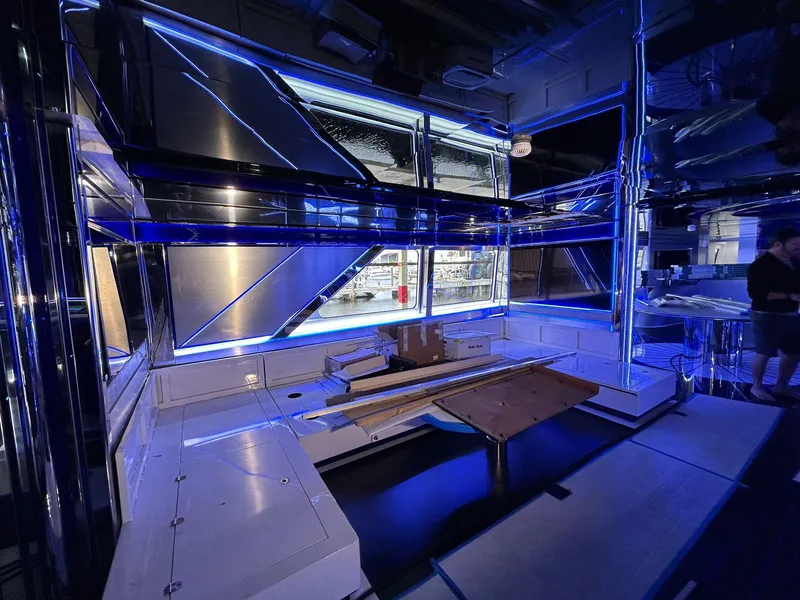 Slide: The Image of Luxurious interior of 1992 Heesen 141 Motor Yacht with modern blue lighting. - 15