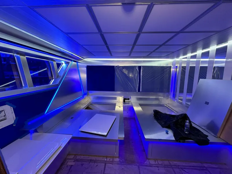 Slide: The Image of Interior of 1992 Heesen 141 Motor Yacht with modern blue LED lighting. - 46