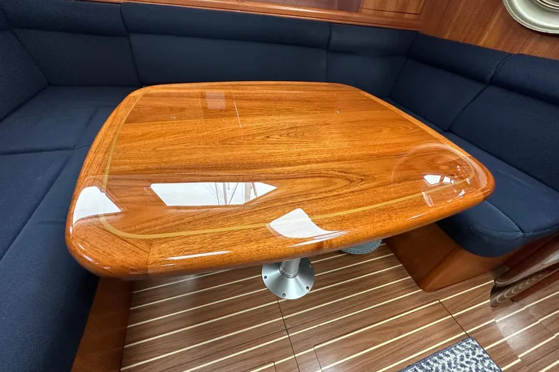 Slide: The Image of Luxurious wooden table in 2003 Hunter 426 Deck Salon yacht interior. - 24