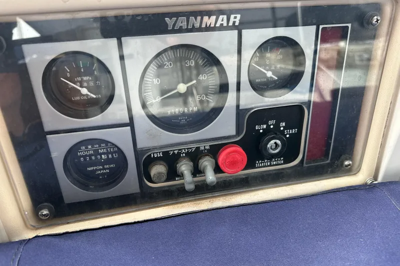 Slide: The Image of Control panel of a 2003 Hunter 426 Deck Salon with Yanmar engine gauges. - 39