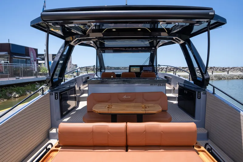 Slide: The Image of Luxurious 2027 Hanover 447 yacht interior with sleek design and comfortable seating. - 2