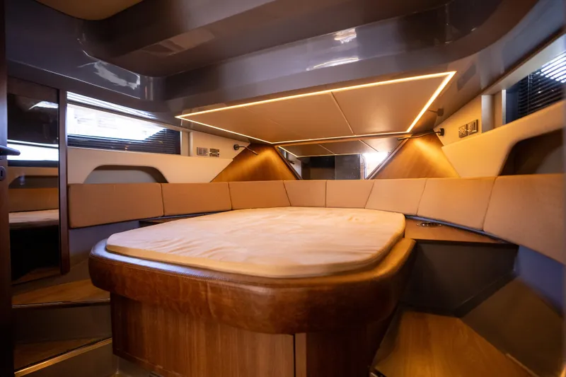 Slide: The Image of Luxurious interior cabin of 2027 Hanover 447 yacht with modern lighting and cozy seating. - 3