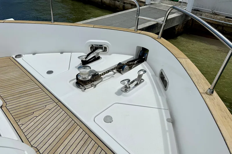 Slide: The Image of Bow deck of 2020 Azimut Magellano 66 yacht with anchor system and teak flooring. - 12