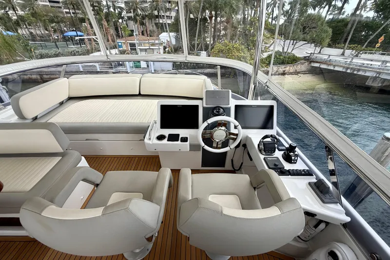 Slide: The Image of Luxurious helm of 2020 Azimut Magellano 66 yacht with modern navigation equipment. - 23