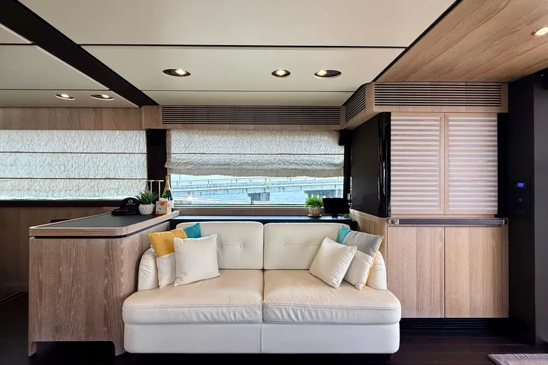 Slide: The Image of Luxurious interior of 2020 Azimut Magellano 66 yacht with elegant seating and modern decor. - 27
