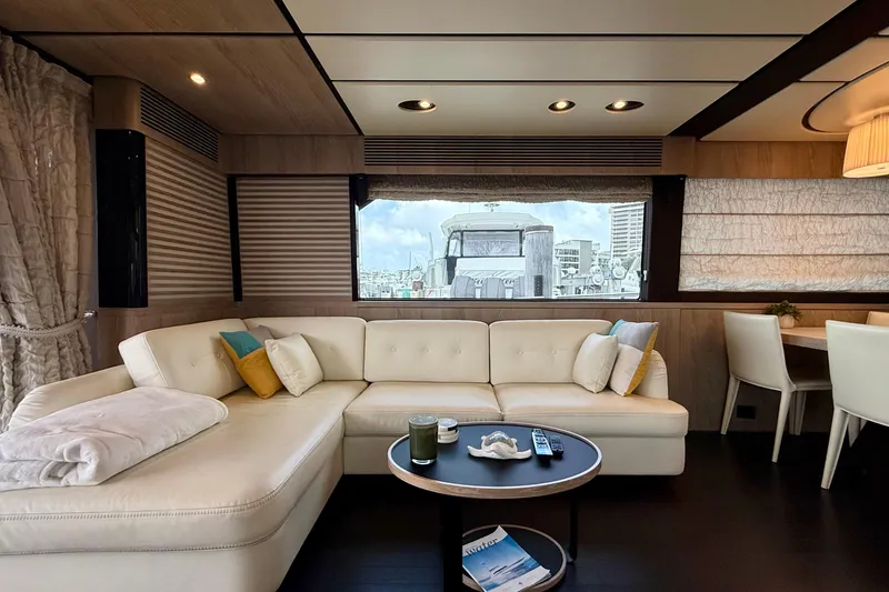 Slide: The Image of Luxurious interior of 2020 Azimut Magellano 66 yacht with elegant seating and modern decor. - 28