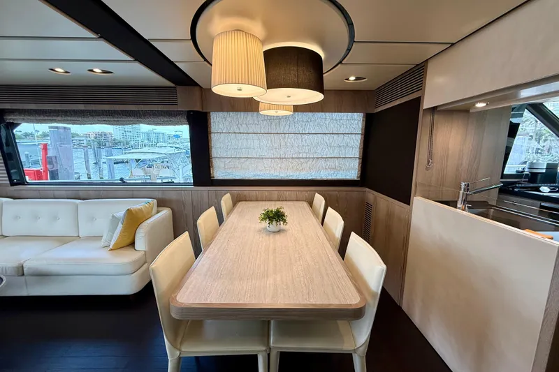 Slide: The Image of Luxurious interior of 2020 Azimut Magellano 66 yacht with elegant dining area and modern decor. - 29