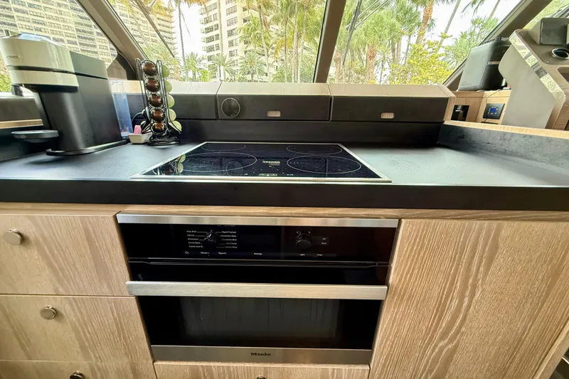Slide: The Image of Modern kitchen in 2020 Azimut Magellano 66 yacht with stove and coffee maker. - 33