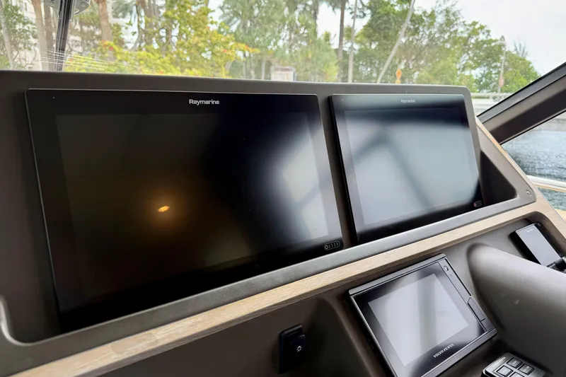 Slide: The Image of Control panel of 2020 Azimut Magellano 66 yacht with Raymarine displays. - 39