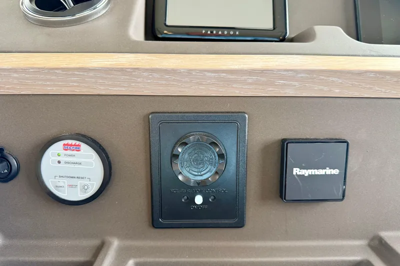 Slide: The Image of Control panel of a 2020 Azimut Magellano 66 yacht featuring Sea-Fire and Raymarine systems. - 44