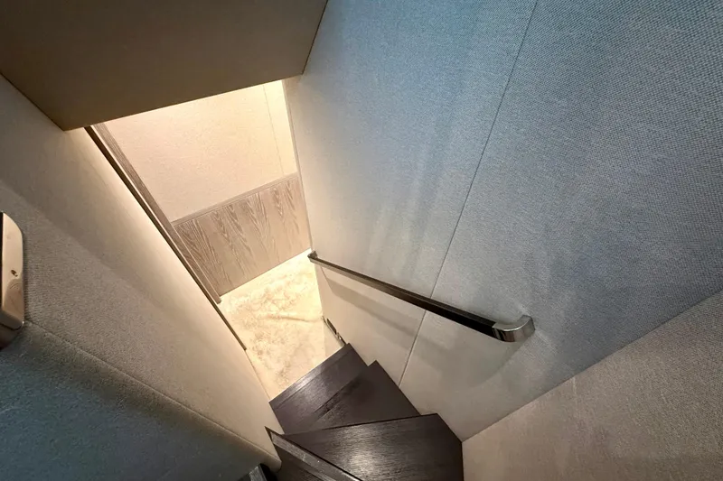 Slide: The Image of Staircase inside 2020 Azimut Magellano 66 yacht, featuring sleek design and modern finishes. - 48