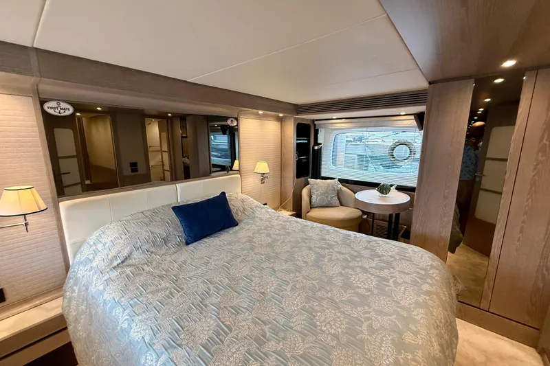 Slide: The Image of Luxurious bedroom interior of 2020 Azimut Magellano 66 yacht with elegant decor and furnishings. - 50