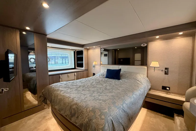 Slide: The Image of Luxurious bedroom interior of 2020 Azimut Magellano 66 yacht with elegant decor. - 53