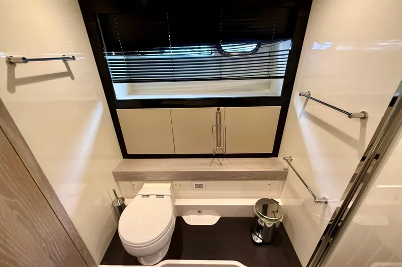 Slide: The Image of Bathroom interior of 2020 Azimut Magellano 66 yacht, featuring modern fixtures and sleek design. - 60